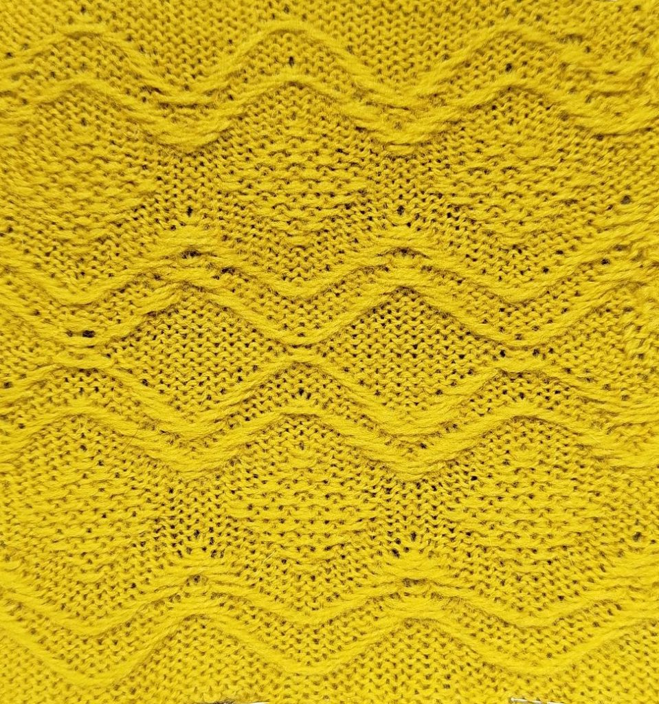 Motif fil tiré tricoté sur machine à tricoter Silver reed SK 280